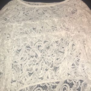 A long sleeve lace ( crop top) with ruffles